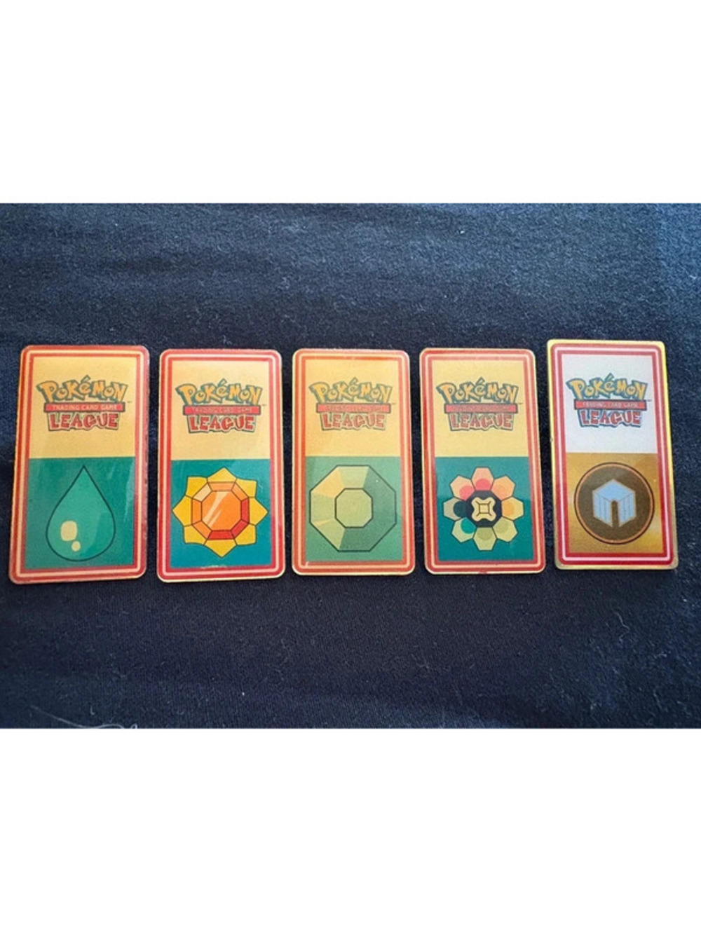1999 pokemon gym badge pins ! Gold !